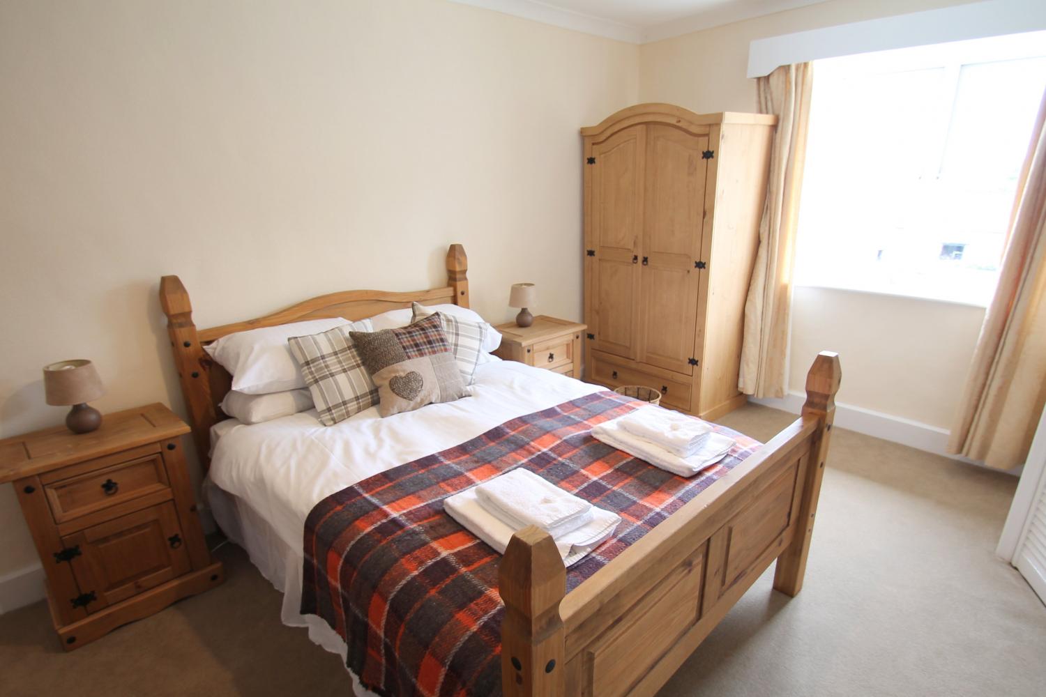 Master bedroom double bedded with ensuite shower and toilet rooms